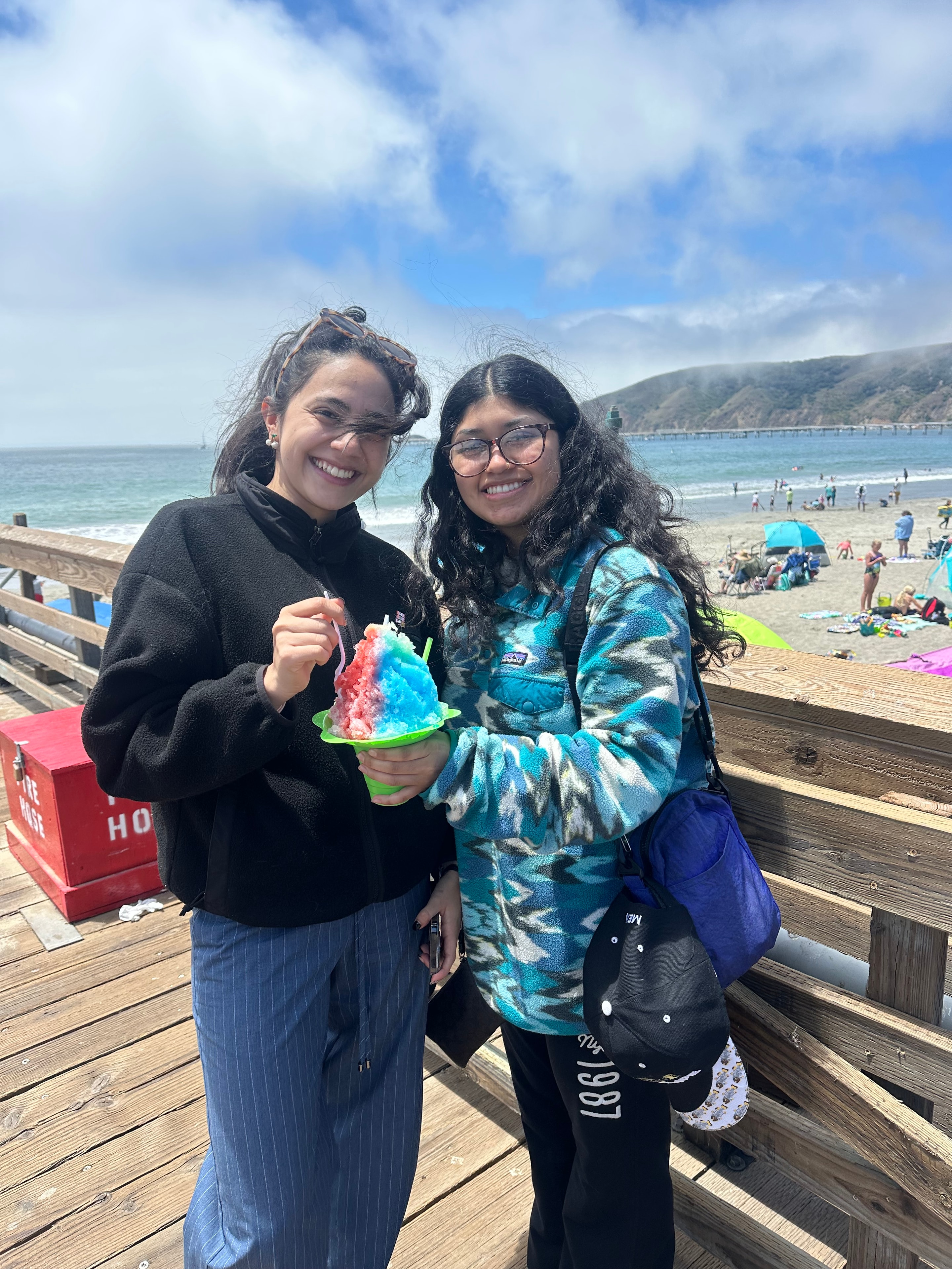 Happy customers enjoying shave ice on the Avila Beach pier