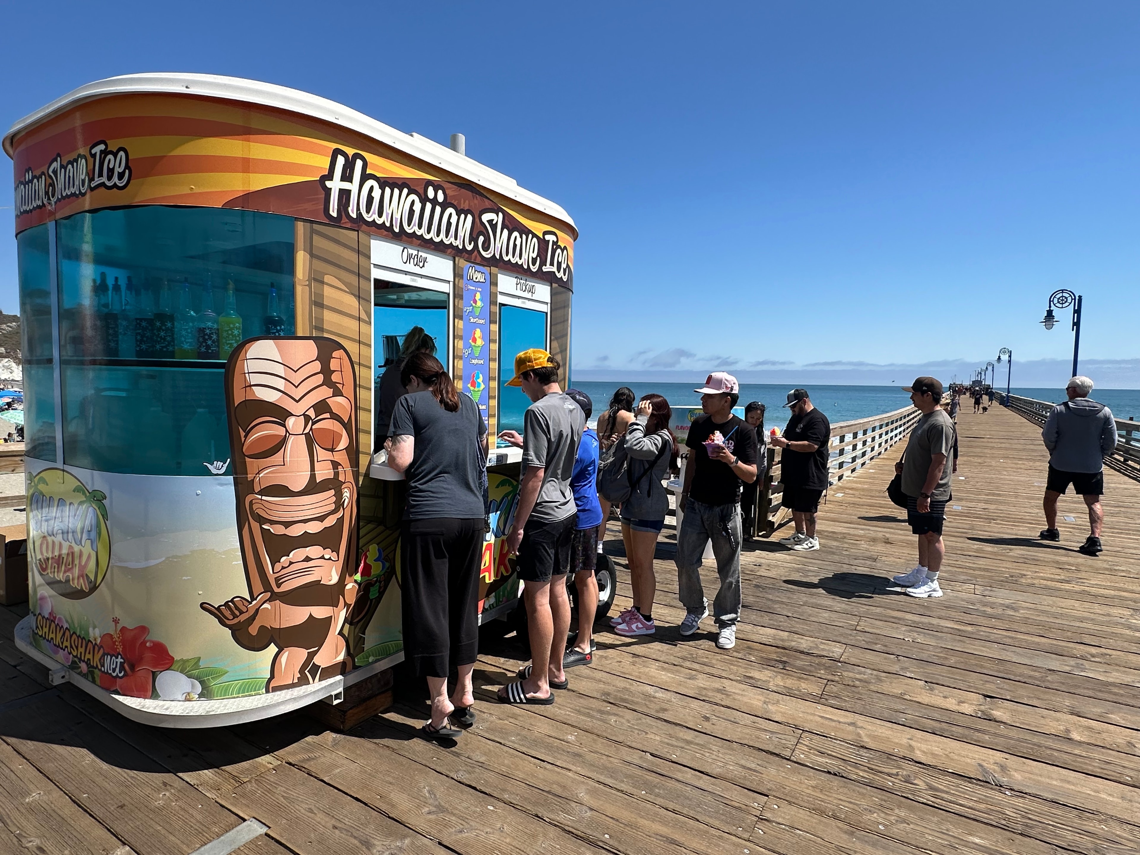 Busy day at the Shaka Shak truck with flavor station