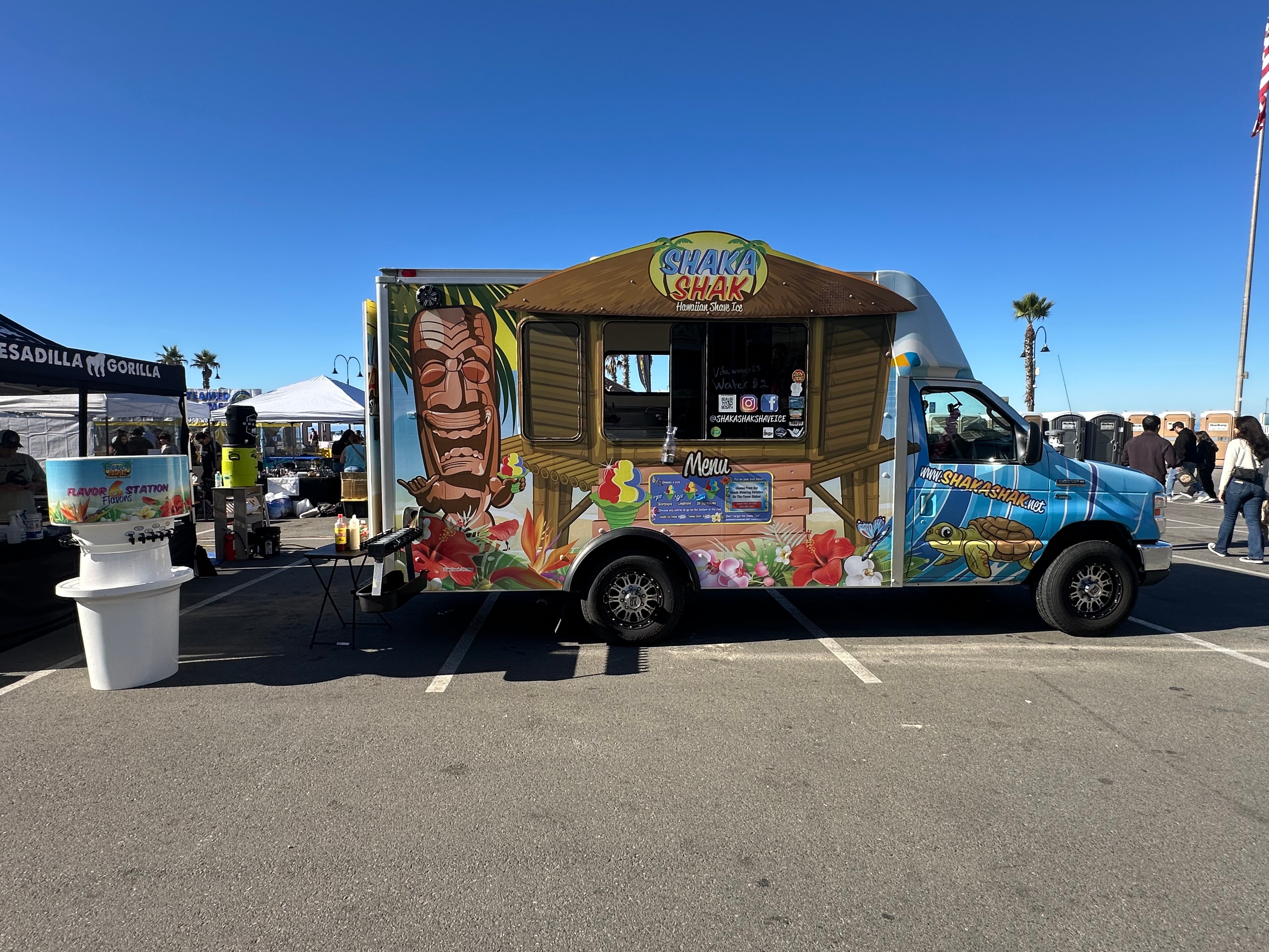Shaka Shak food truck full side view at an outdoor event