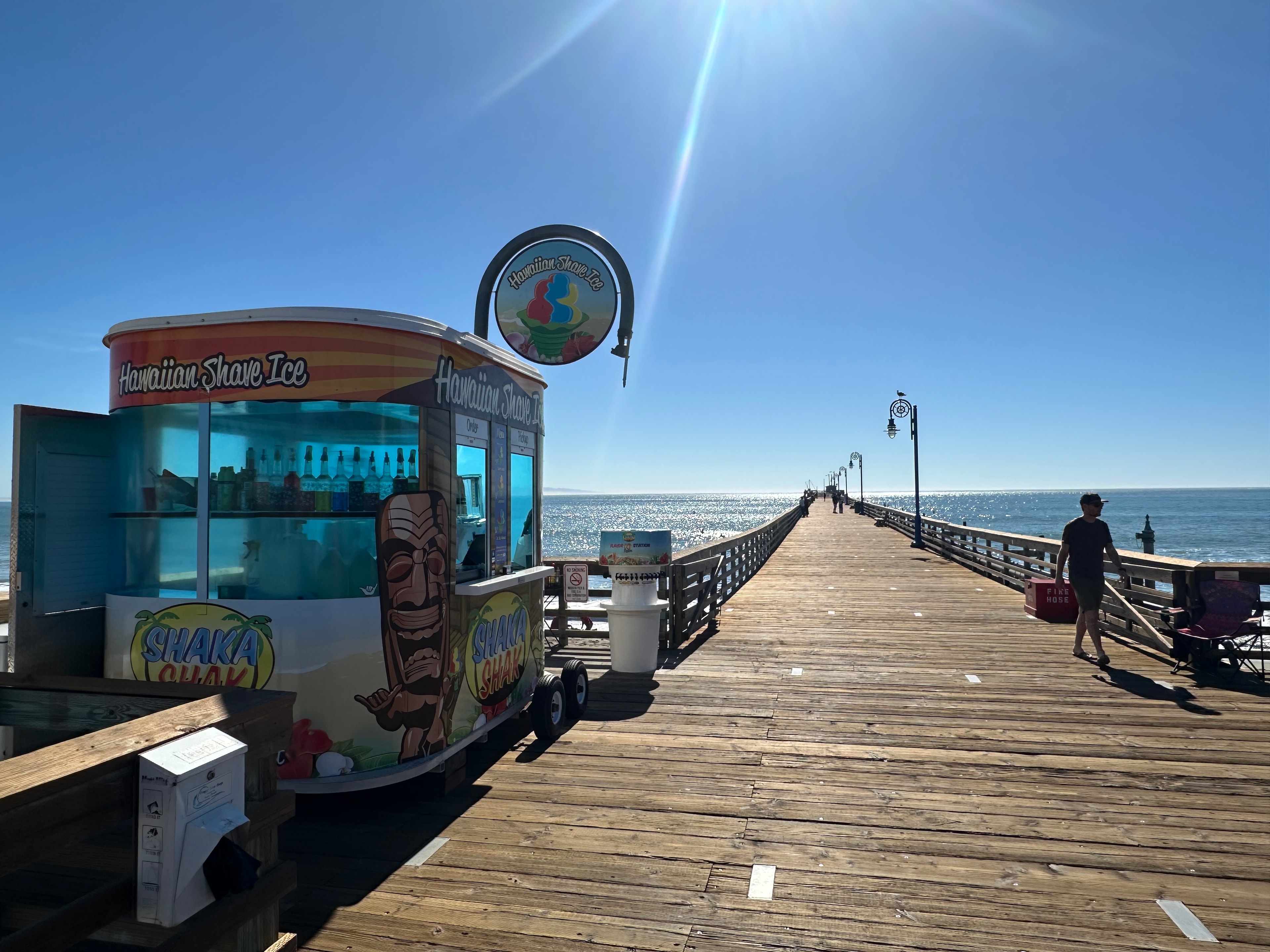 Shaka Shak kiosk on the Avila Beach pier on a sunny day