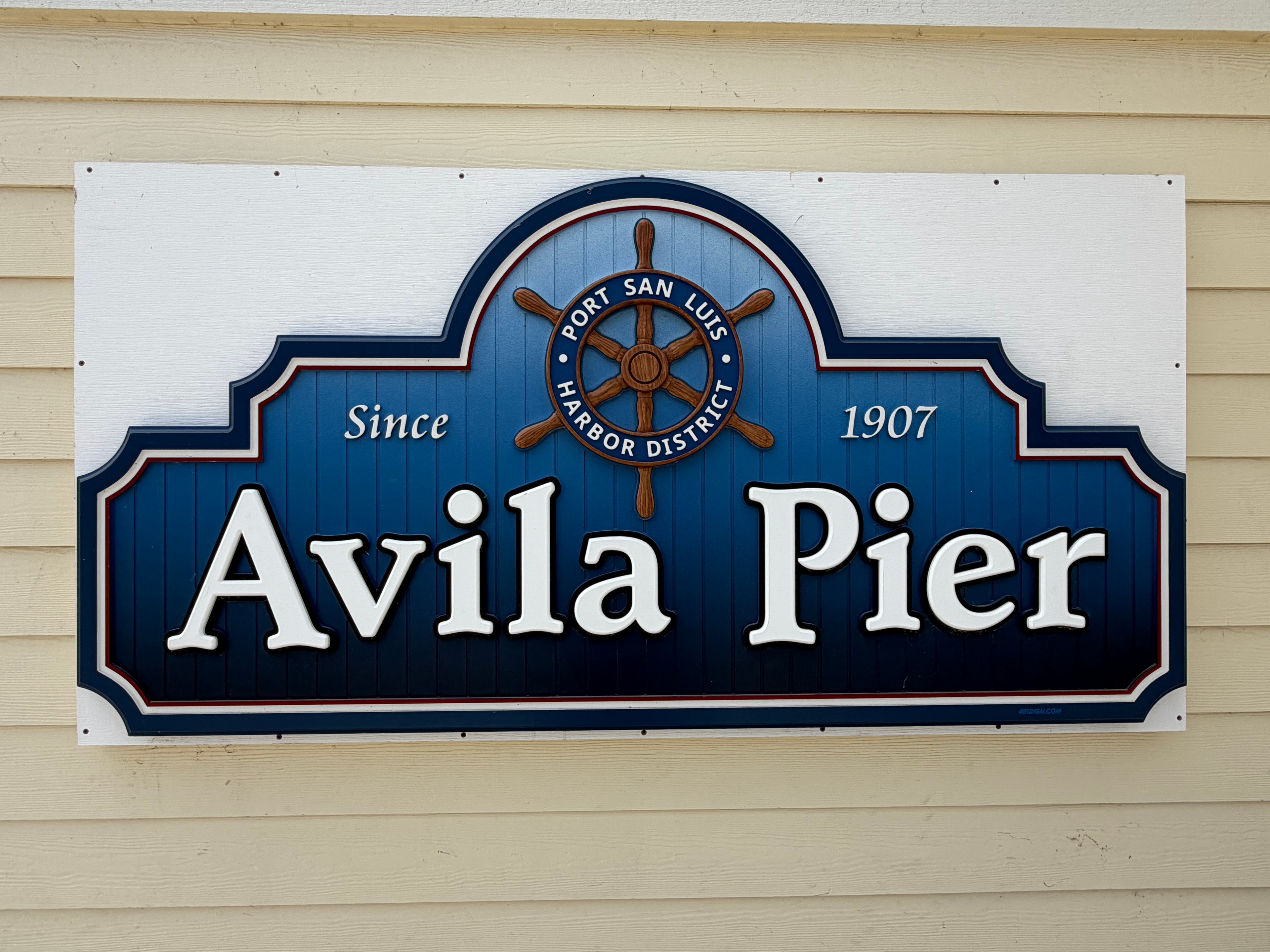 Avila Pier Port San Luis Harbor District sign established 1907